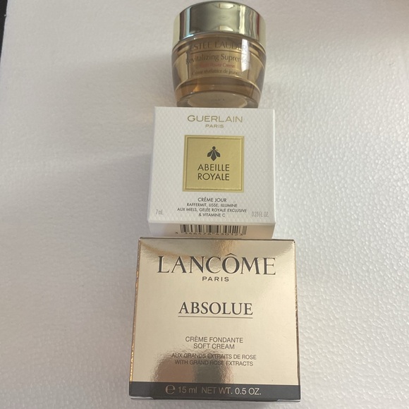 NEW. LANCÔME GUERLAIN ELIZABETH ARDEN cremes and 2 makeup pouches. All new. - Picture 11 of 12